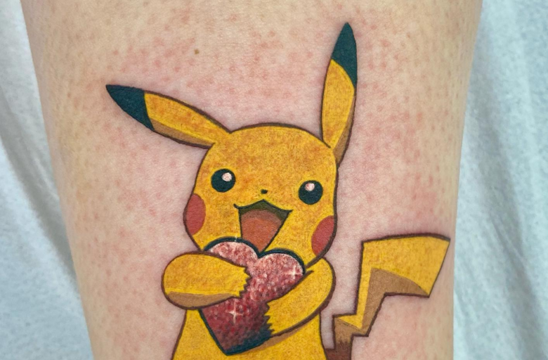 Pop art Pikachu tattoo on the elbow.